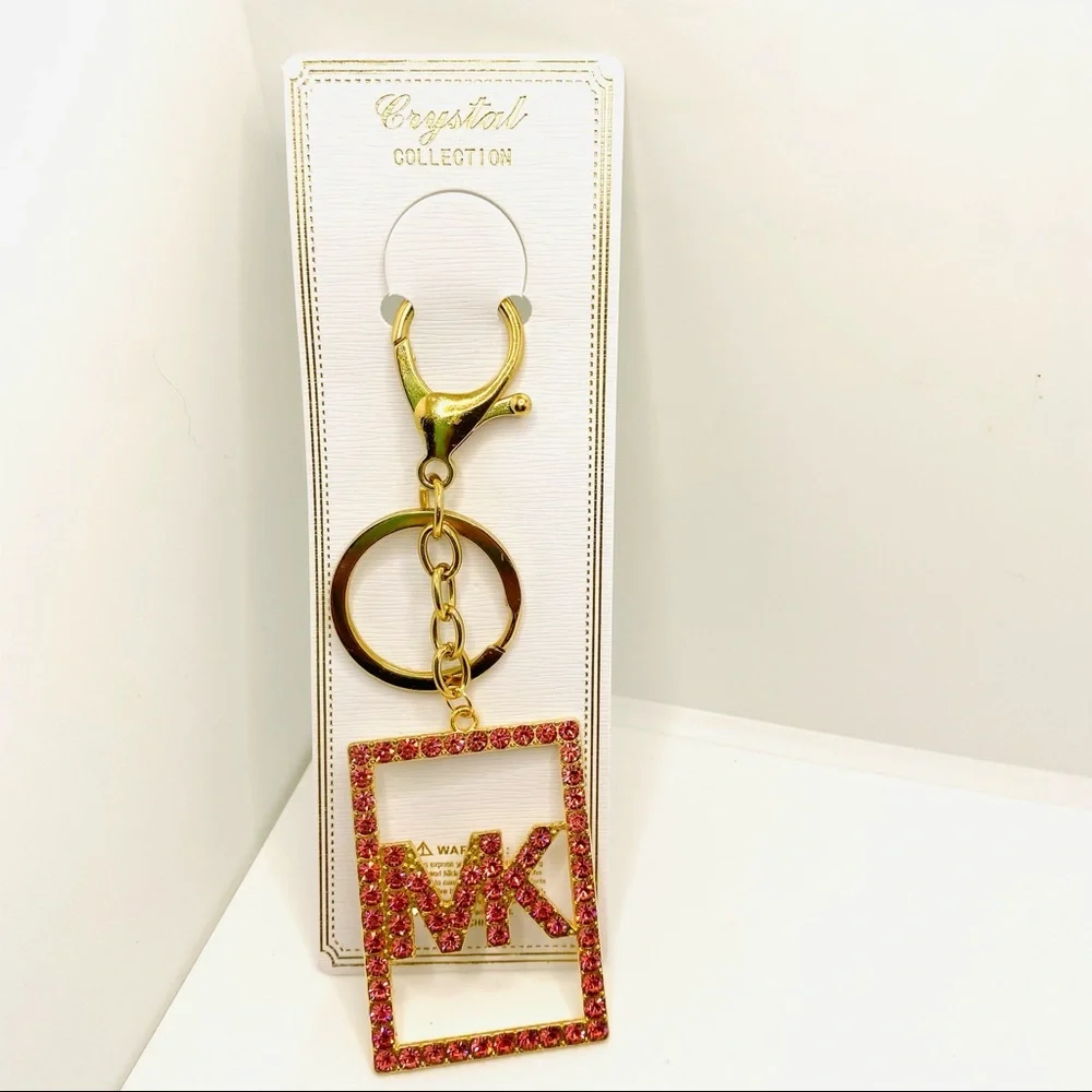 Purse Charm Key Chain MK Pink Crystals set in golden tone. BRAND NEW
